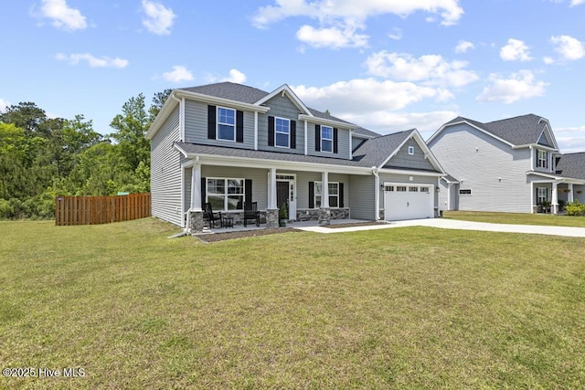 craftsman inspired home featuring covered porch, a garage, fence, a front lawn, and concrete driveway