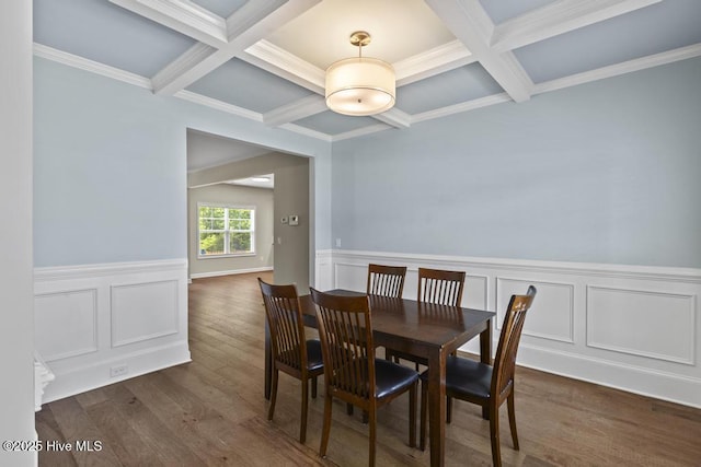 dining room with beamed ceiling, dark wood-type flooring, and coffered ceiling