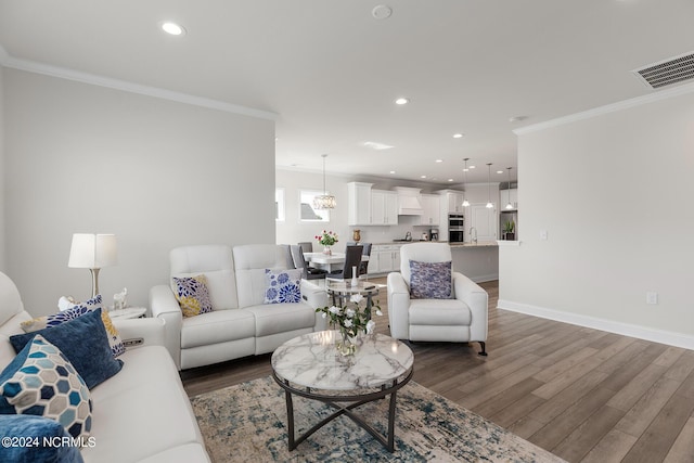 living room featuring crown molding and dark hardwood / wood-style flooring