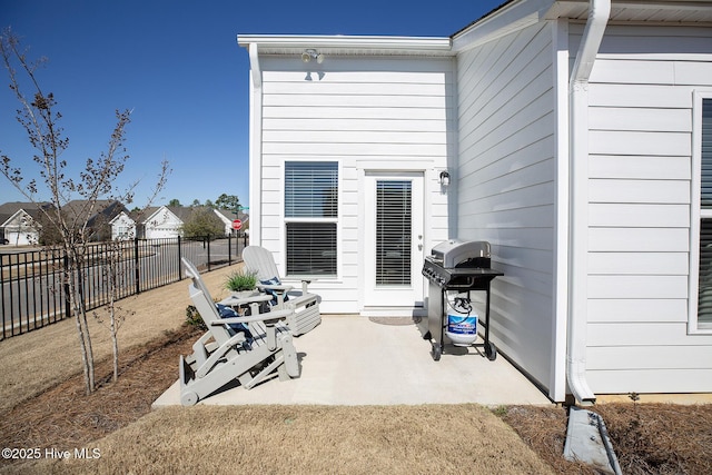 view of patio featuring a grill