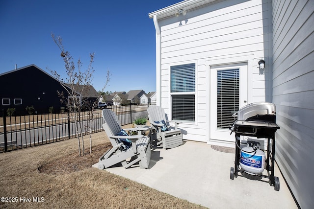 view of patio featuring a grill