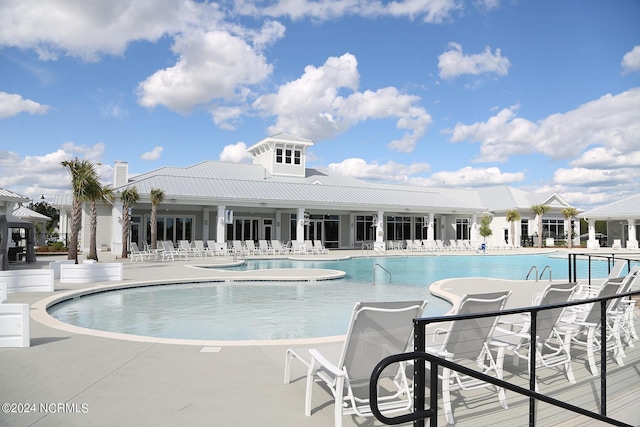 view of pool featuring a patio area