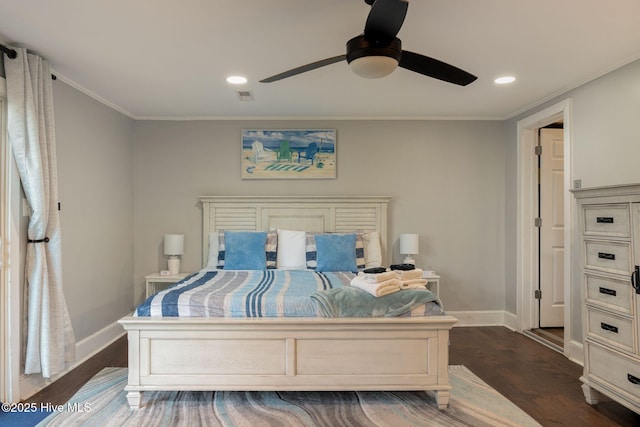 bedroom with ornamental molding, ceiling fan, and dark hardwood / wood-style flooring