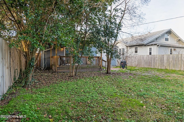 view of yard featuring a deck