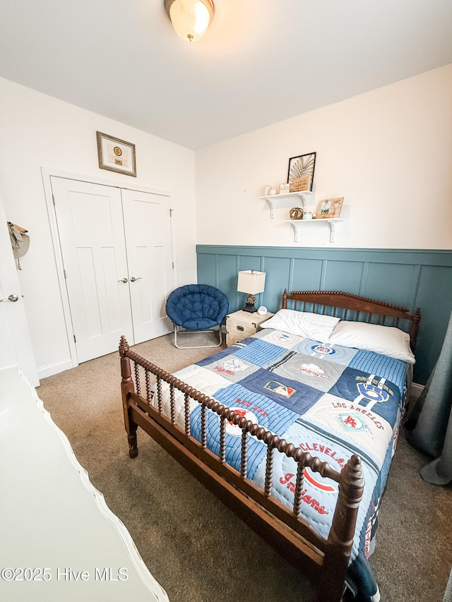 bedroom featuring a closet and carpet