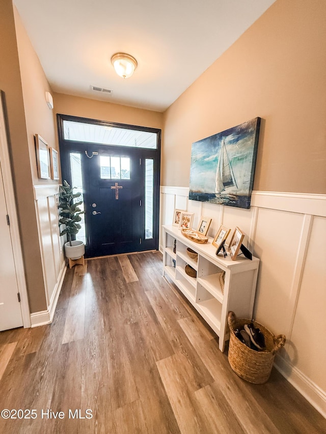 entrance foyer featuring hardwood / wood-style flooring