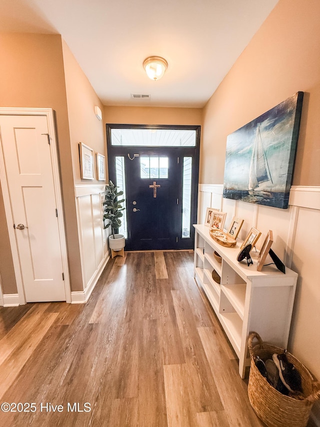 foyer entrance featuring hardwood / wood-style flooring