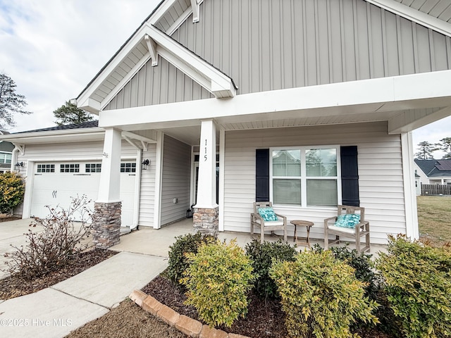 view of front of home with a garage and covered porch