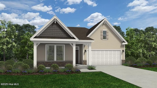 view of front of home with stone siding, driveway, a front lawn, and an attached garage