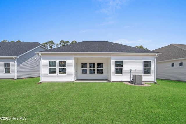 1204 Calabash Station Blvd NW, Calabash, NC 28467 - rear view of property with a yard, a patio, and central air condition unit