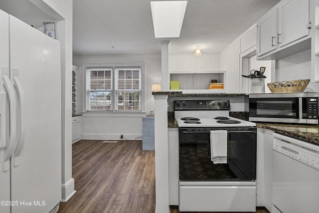 3401 Taylor St, Morehead City, NC 28557 - kitchen featuring white cabinetry, dark stone counters, white appliances, dark wood-type flooring, and a textured ceiling