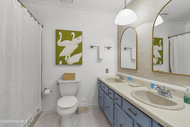 3401 Taylor St, Morehead City, NC 28557 - bathroom with ornamental molding, toilet, and vanity