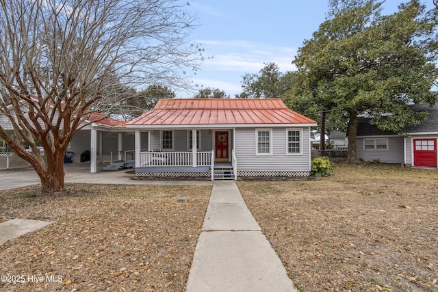3401 Taylor St, Morehead City, NC 28557 - view of front of home featuring a front lawn and covered porch