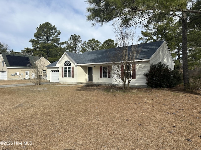 ranch-style home with a garage