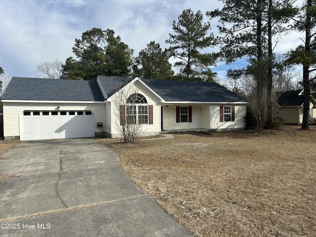 ranch-style house with a garage, concrete driveway, and a shingled roof