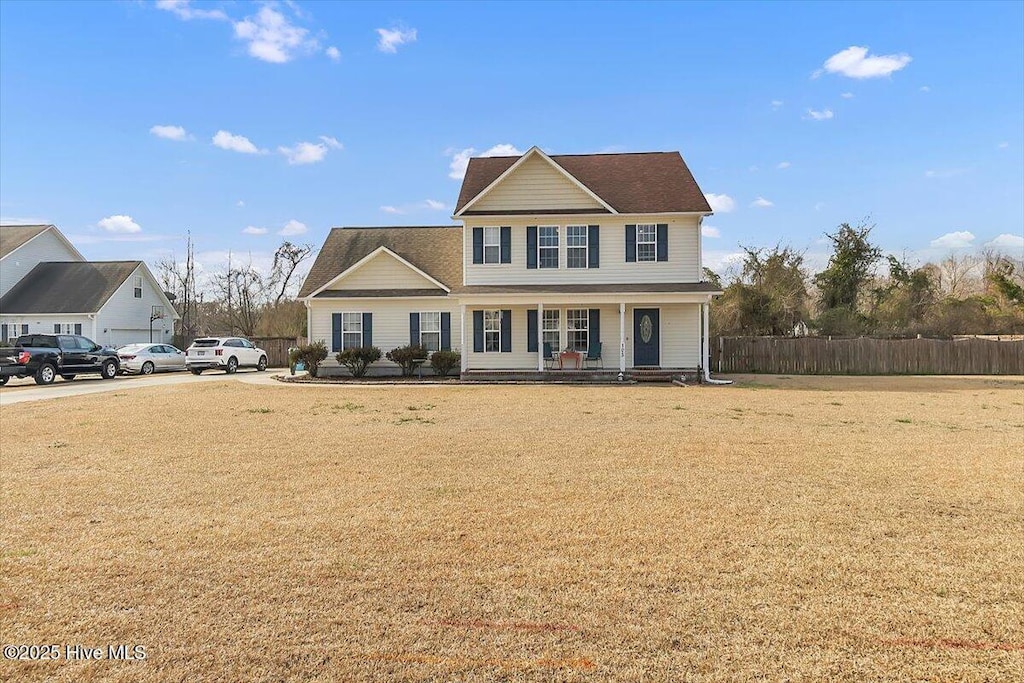 front of property with a front lawn and a porch