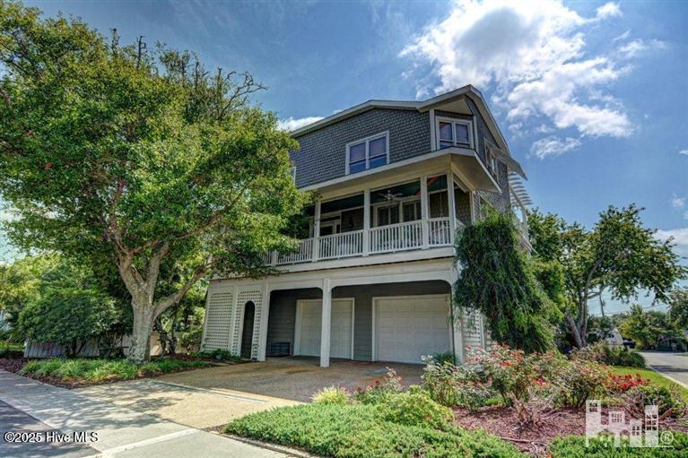 view of front of property with a garage