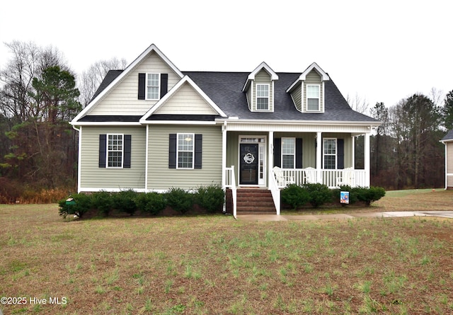 view of front of home with a front lawn and covered porch