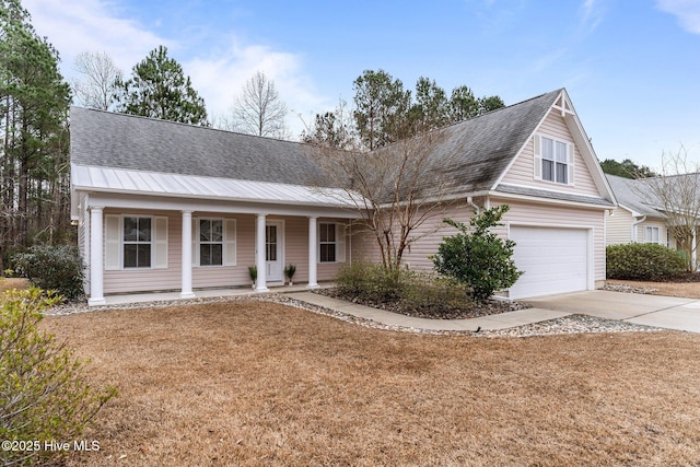 view of front of house featuring a garage and covered porch