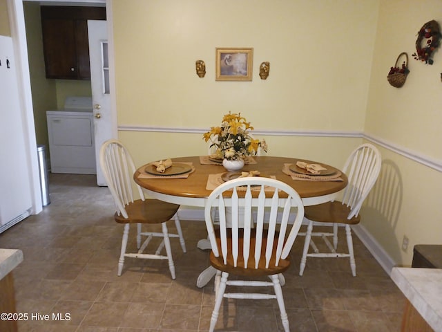 dining area featuring washer / clothes dryer