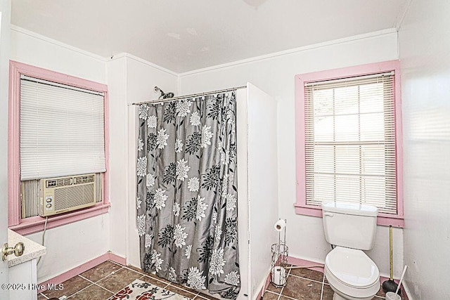 bathroom featuring vanity, a wealth of natural light, tile patterned floors, and walk in shower