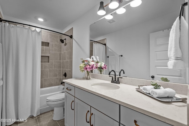 full bathroom with vanity, shower / tub combo with curtain, tile patterned floors, and toilet