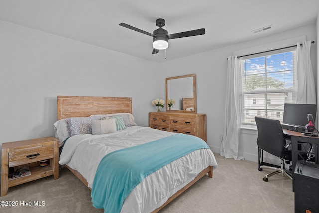 carpeted bedroom featuring ceiling fan