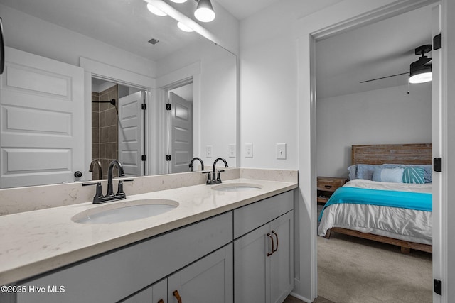 bathroom with vanity and ceiling fan