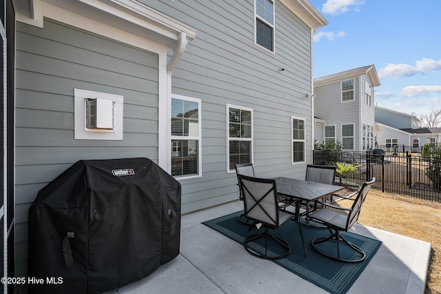 view of patio with a grill