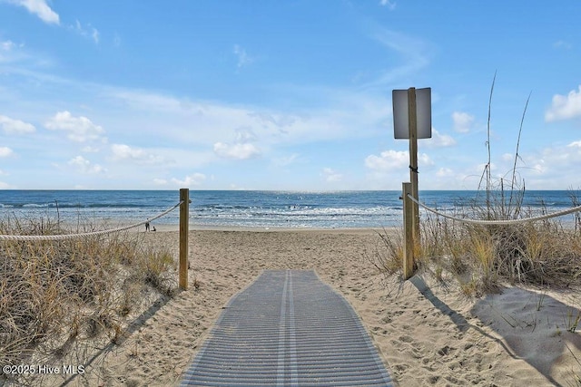 water view featuring a beach view