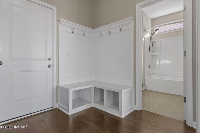 mudroom featuring dark wood-style floors