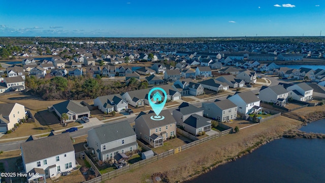 aerial view featuring a residential view and a water view