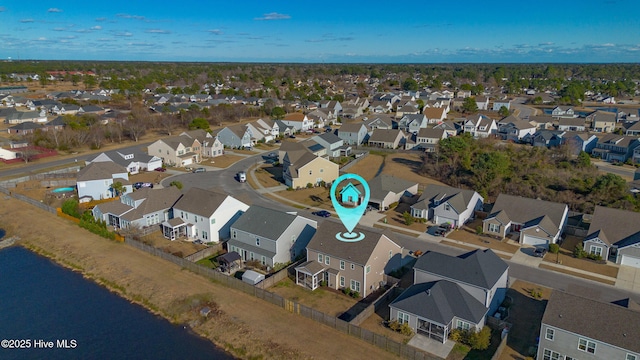 aerial view with a water view and a residential view