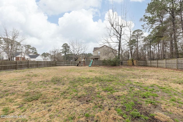 view of yard with a playground