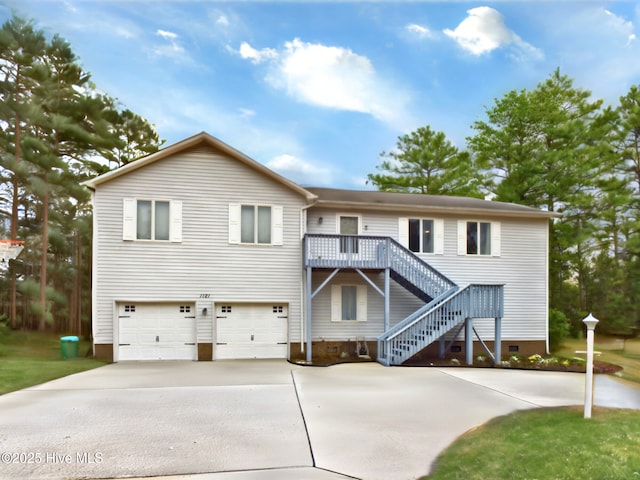 view of front of home featuring a garage and a deck