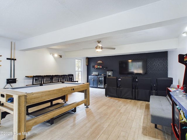 rec room featuring ceiling fan, bar area, billiards, and light hardwood / wood-style flooring