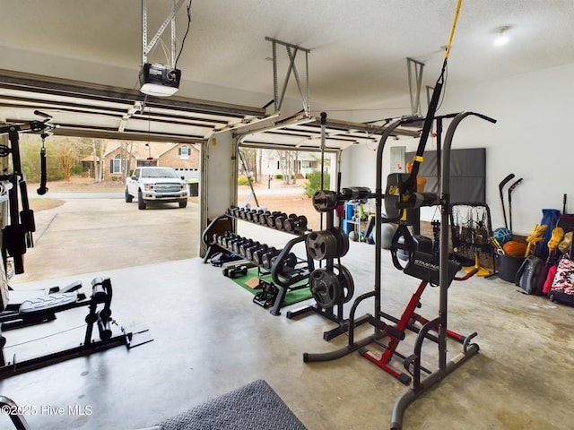 garage featuring a garage door opener