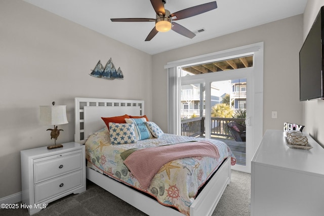 bedroom with dark carpet, access to outside, and ceiling fan