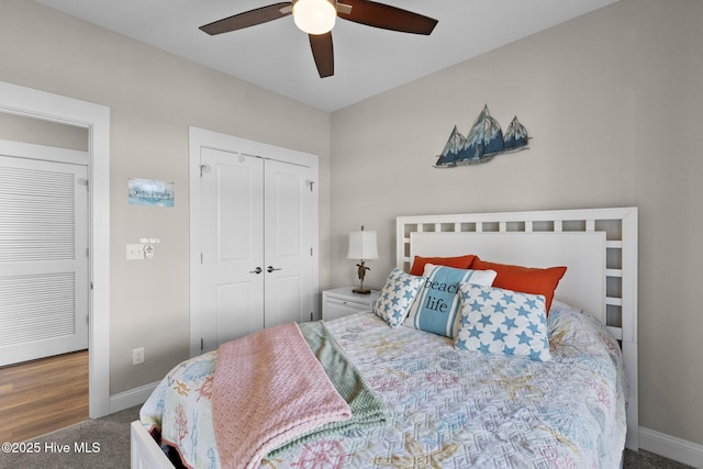 bedroom featuring ceiling fan, carpet flooring, and a closet