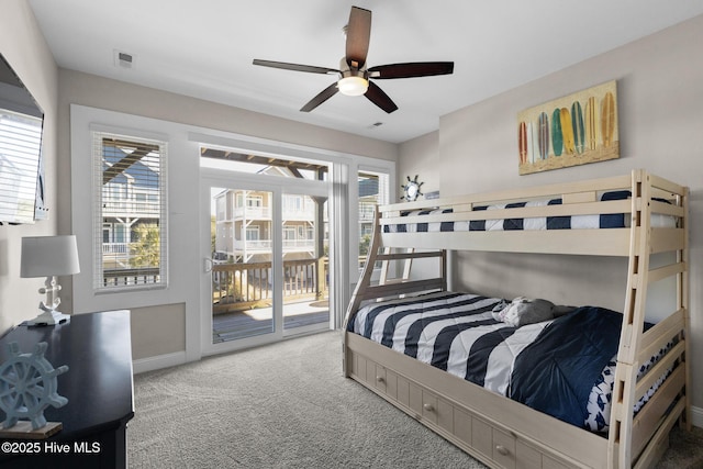 carpeted bedroom with access to outside and ceiling fan