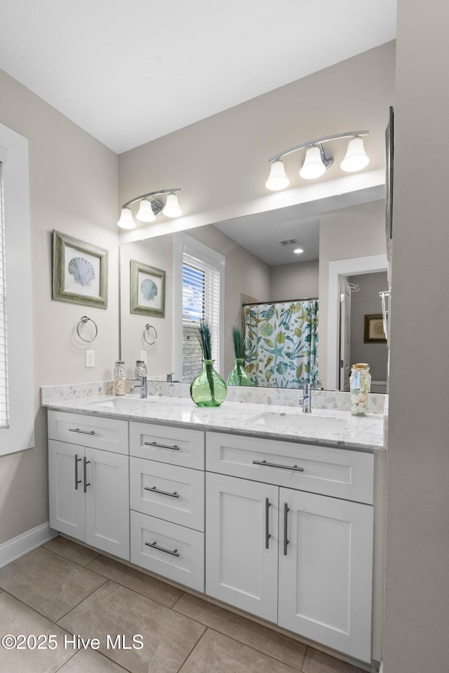 bathroom with vanity, tile patterned floors, and a shower with shower curtain