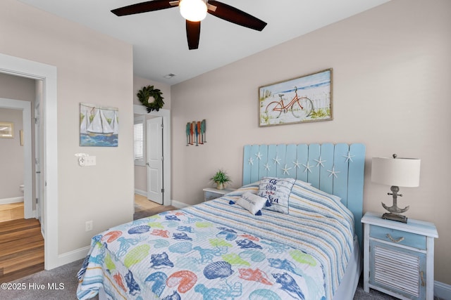 bedroom featuring ceiling fan and carpet floors