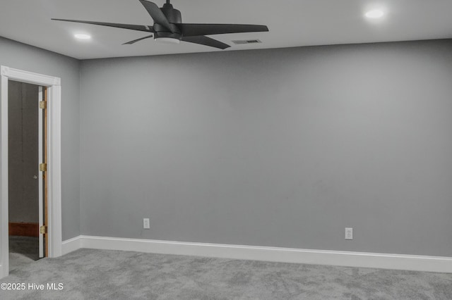 carpeted empty room with ceiling fan