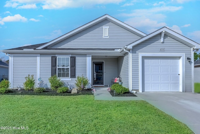 ranch-style home featuring a garage and a front yard