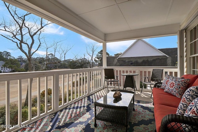 balcony featuring outdoor lounge area