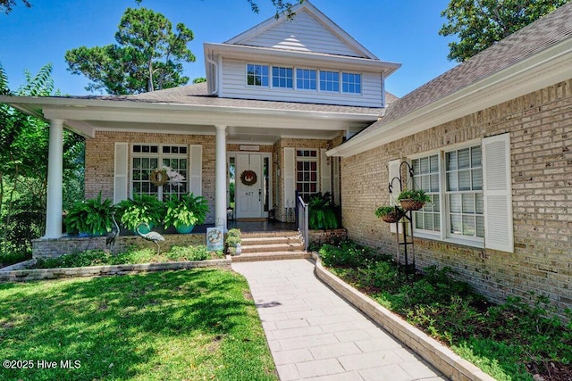 entrance to property with a porch