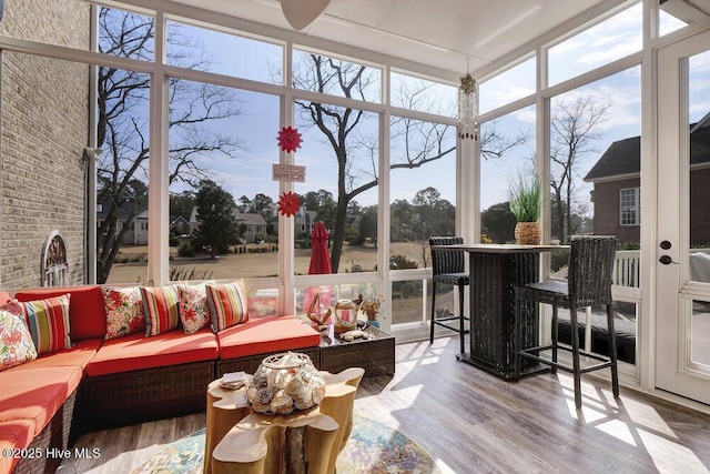 sunroom / solarium featuring a wealth of natural light