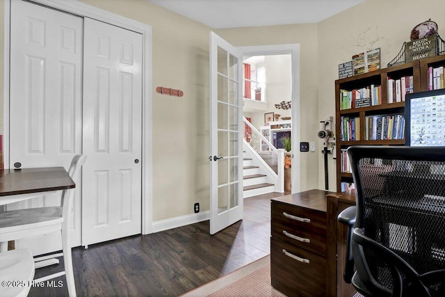office area featuring french doors, dark wood finished floors, and baseboards