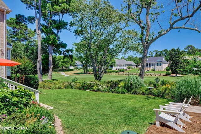 view of yard featuring a residential view