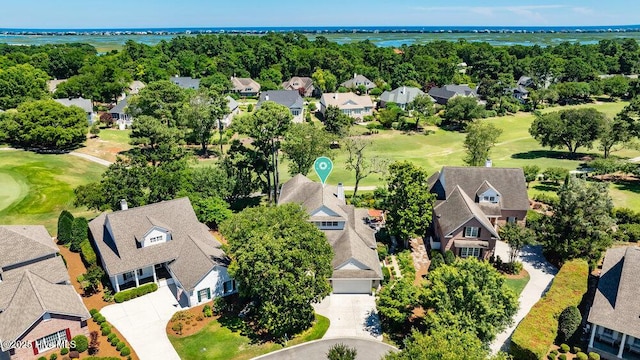 aerial view with a water view, a residential view, and golf course view